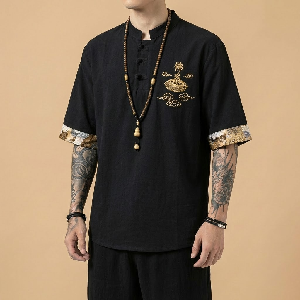 Yulan Mandarin Shirt in black with gold embroidery, front view