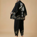 Kurotsuru Kimono Set with imperial gold crane motif, model front view