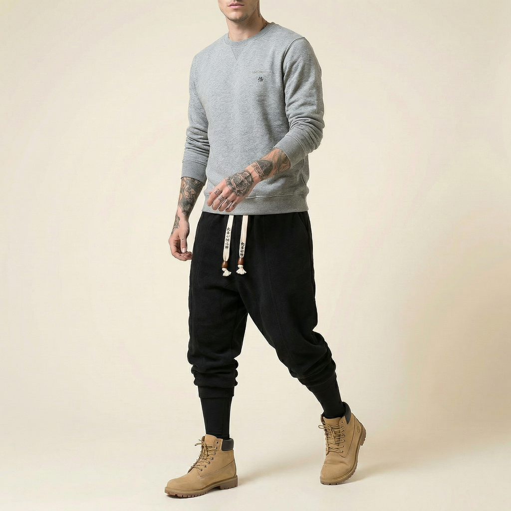 Qiren Flow Pants in black, front view