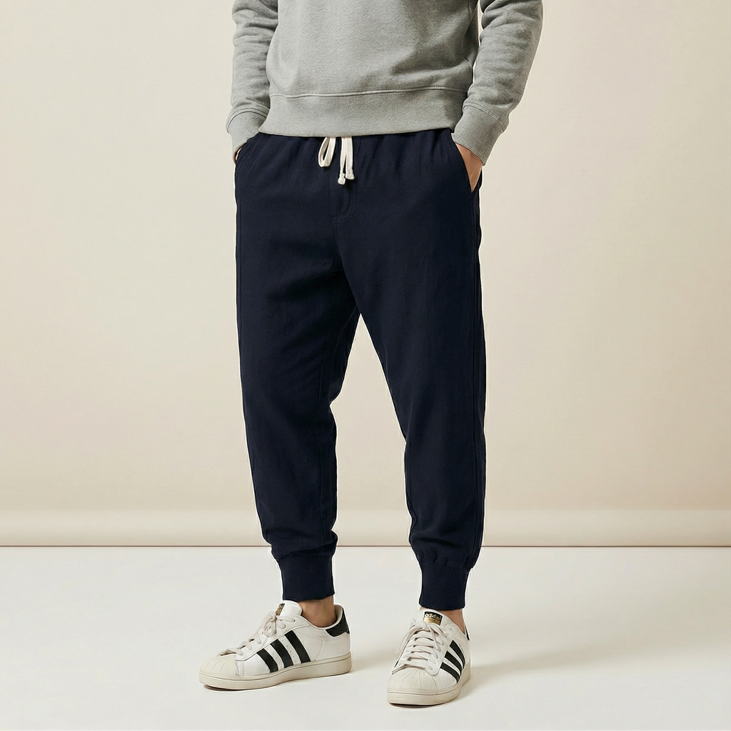 Shenyu Flow Pants in navy blue, tapered fit, front view