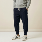 Shenyu Flow Pants in navy blue, tapered fit, front view
