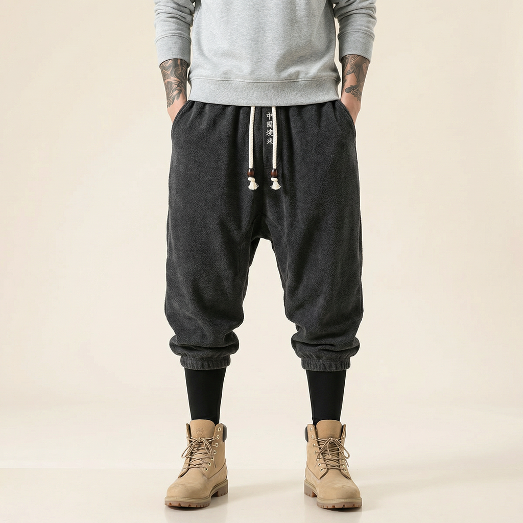 Qiren Flow Pants in dark grey, front view