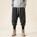 Qiren Flow Pants in dark grey, front view