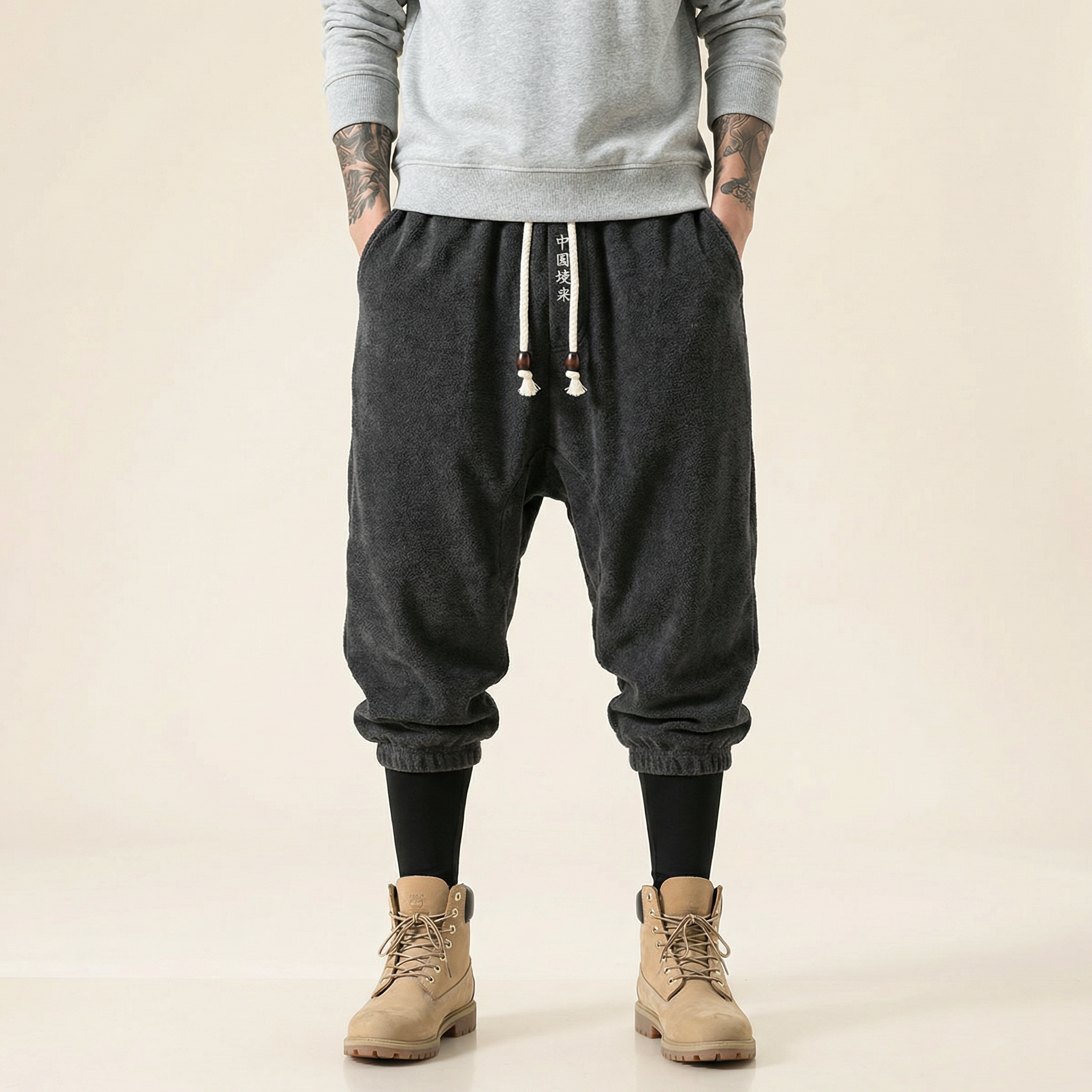 Qiren Flow Pants in dark grey, front view