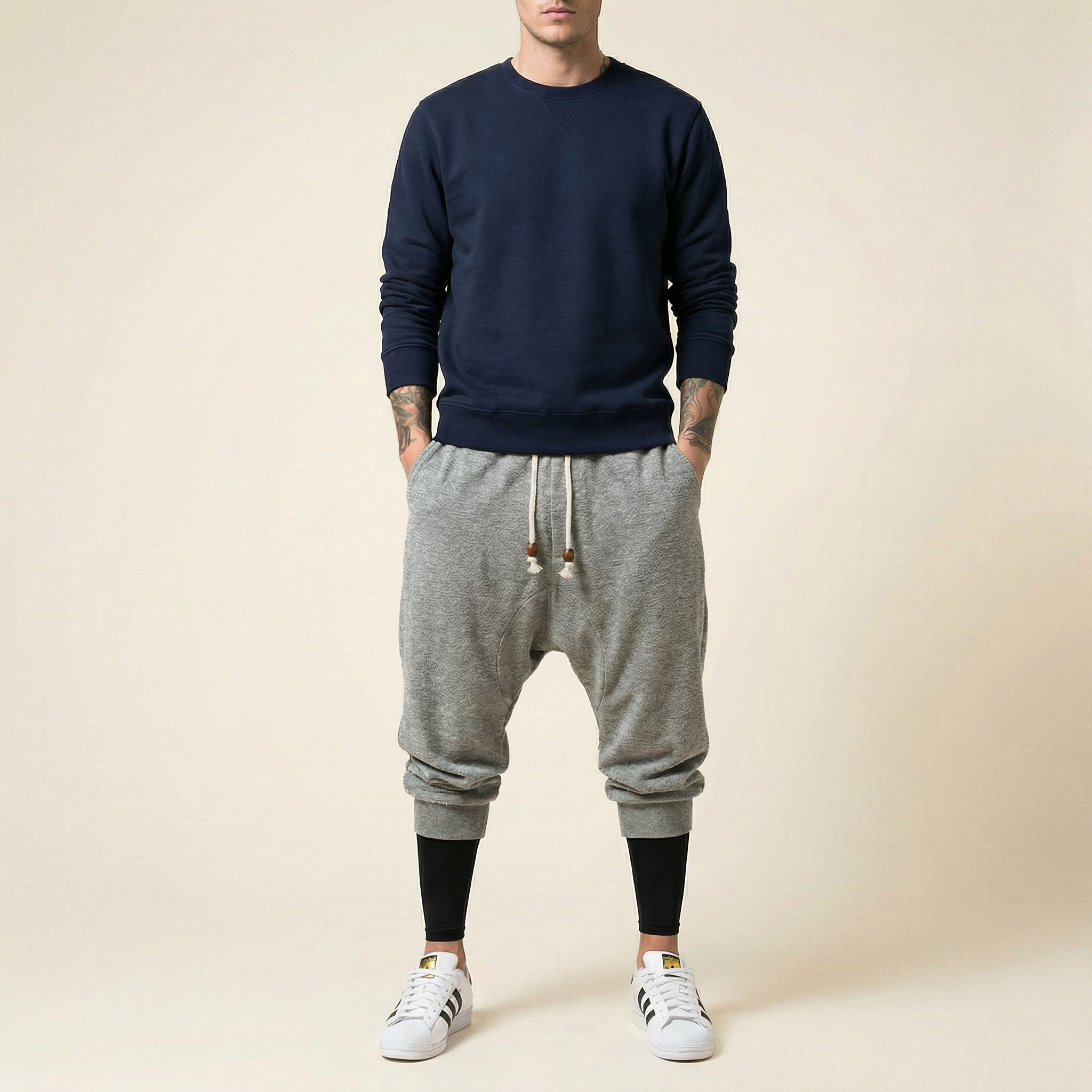 Qiren Flow Pants in heather grey, tapered drop crotch, front view