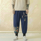 Hanami Linen Flow Pants in navy blue with contrast panel detail, front view