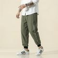 Mingrui Flow Pants in olive green, front view