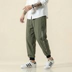 Mingrui Flow Pants in olive green, front view