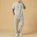 Shiori Set in black, short-sleeve top and drawstring pants, full body front view